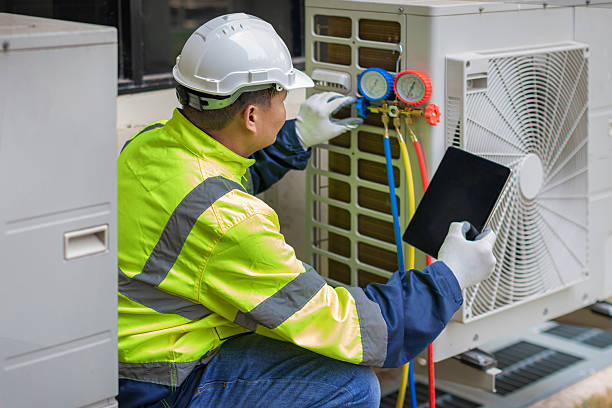 Professional Hvac technician working in Chester, WV